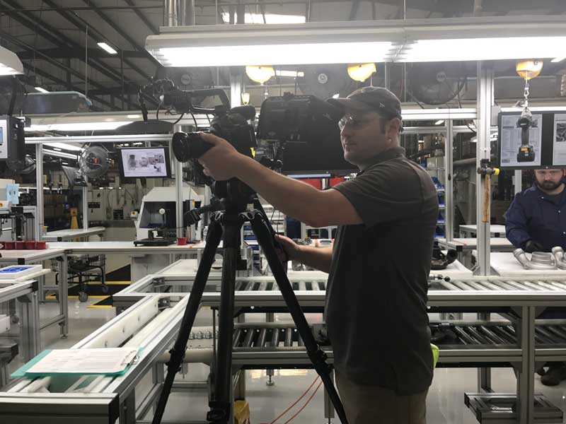 Cameraman during training video production Cameraman filming Training Video Production